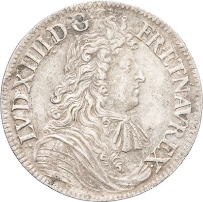 une pièce d'argent sur laquelle figure l'effigie d'un homme aux cheveux longs