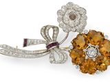 a diamond and citrine broochle, by van cleef