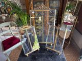a glass display case with a mirror on top of it