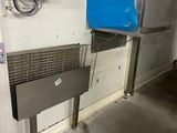 an image of a machine that is in a garage