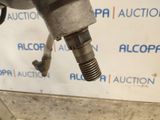 an image of a close up of a metal object on a table