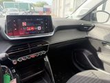 a car dashboard with a digital display in the center