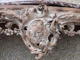 a close up of a bench on a tiled floor