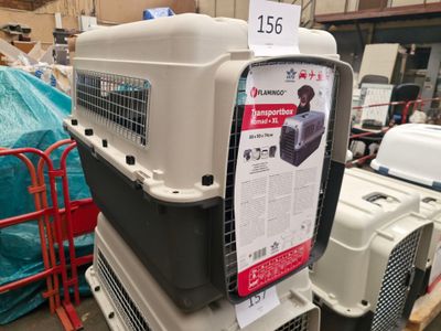 many different types of pet carriers stacked on top of each other