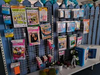 a display of various items on a shelf in a room