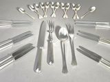 many spoons, forks and spoons arranged in a circle
