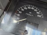a close up of a speedometer in a car