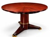 une photo d'une table à manger ronde avec un plateau en bois