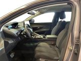 the interior of a car with the door open and the driver ' s seat down