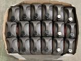 a cardboard box filled with a bunch of empty soda bottles