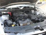 the engine of a car with its hood open and the hood open