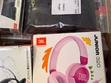 a box with a bunch of headphones in it