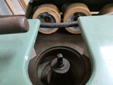 a picture of a machine that has wheels on it