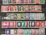 a collection of stamps and stamps from different countries