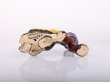 a small figurine of a man on a skateboard