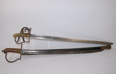deux épées exposées sur une table