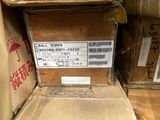 a box with a price label on it sitting on a shelf