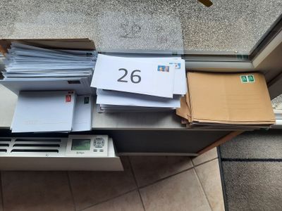 a lot of papers that are sitting on a table