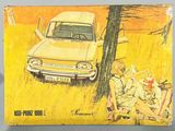 a yellow book with a picture of a woman and a car in the background