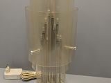 an image of a clear glass vase with a silver base