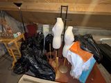 a picture of a cluttered room with a lot of stuff on the floor