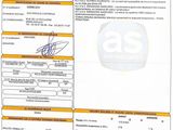 an image of a close up of a document with a barcode on it