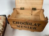 a wooden box with a sign on it that says chocolate menner