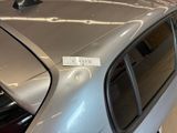 a car that has a sticker on the side of it