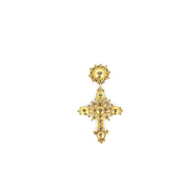 une image d'une croix dorée sur fond blanc
