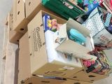a pile of boxes sitting on top of a pallet in a store