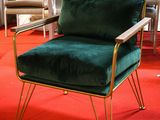 a chair that is sitting in the middle of a room