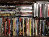 a lot of dvds in a box on the table