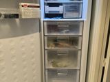 an open refrigerator that has food inside of it