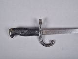 a knife that is laying on top of a table
