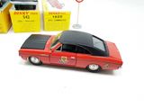 a toy car that is sitting on a table next to other toy cars