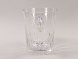 a glass that is sitting on a table