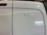 a white van with a sticker on the side of it