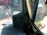 a control panel in the front seat of a car