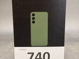 le dos d'une boîte contenant un téléphone vert