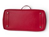 a red case that is sitting on top of a white surface