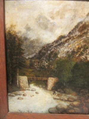 a picture of a painting of a river in a wooden frame