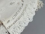 a close up of a piece of lace on a table