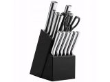 a set of knives in a black holder on a white background
