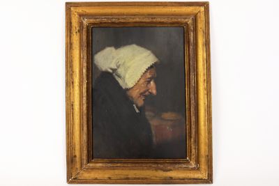 tableau représentant une vieille femme coiffée d'un bonnet blanc, dans un cadre doré