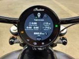 a close up of a motorcycle ' s dashboard with a clock on it