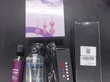 a bottle of liquid, a bottle of perfume and a box of hair care products