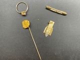a close up of a metal object with a ring and a stick