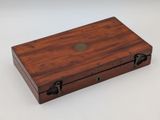 an image of a wooden box on a white surface