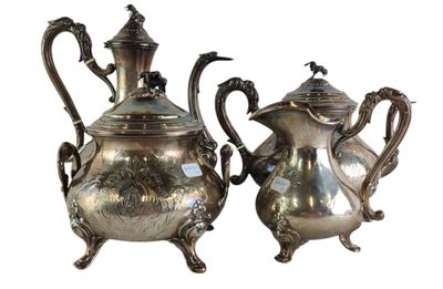 pair of antique silver plated teapots with ornate handles