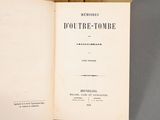 an open book with a black and white title on it